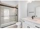 Bathroom with walk-in shower and white vanity at 1198 Lost Cove Rd, Indian Land, SC 29707