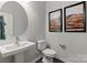 Clean powder room with a pedestal sink at 1198 Lost Cove Rd, Indian Land, SC 29707