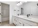 Double vanity bathroom with white cabinets and black fixtures at 1198 Lost Cove Rd, Indian Land, SC 29707