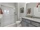 Modern bathroom with a large shower and granite countertop at 1198 Lost Cove Rd, Indian Land, SC 29707