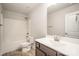 A bathroom with a shower-tub combo, a vanity, and neutral walls at 159 Rubys Way # 35, Oakboro, NC 28129