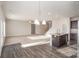 This expansive living room offers hardwood floors, recessed lighting, and a cozy atmosphere at 159 Rubys Way # 35, Oakboro, NC 28129