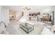 Spacious living room with open floor plan flowing into a modern kitchen and dining area at 159 Rubys Way # 35, Oakboro, NC 28129