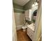 Clean bathroom with a tub, toilet, and vanity with storage at 1801 Brandywine Dr, Matthews, NC 28105