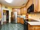 Kitchen with stainless steel appliances and wood cabinets at 1801 Brandywine Dr, Matthews, NC 28105