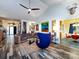 Bright living room with hardwood floors, unique art, and open floor plan at 1801 Brandywine Dr, Matthews, NC 28105