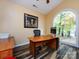 Home office with large window and built-in shelving at 1801 Brandywine Dr, Matthews, NC 28105