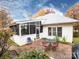 Cozy brick patio adjacent to sunroom at 1801 Brandywine Dr, Matthews, NC 28105