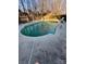 Kidney-shaped swimming pool in backyard at 1801 Brandywine Dr, Matthews, NC 28105