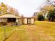 Fenced backyard with a shed and plenty of space for outdoor activities and storage at 1905 26Th Ne St, Hickory, NC 28681