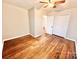 Bedroom featuring hardwood floors, ceiling fan, closet, and neutral walls at 1905 26Th Ne St, Hickory, NC 28681