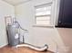 The laundry room features hookups, and window providing natural light at 1905 26Th Ne St, Hickory, NC 28681