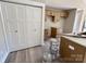 White pantry doors and light brown kitchen cabinets at 3537 Taxahaw Rd, Lancaster, SC 29720