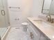 Small bathroom with shower, toilet and white vanity at 405 19Th Avenue Nw Cir, Hickory, NC 28601