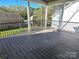 Spacious deck with black metal railings, offering backyard views at 405 19Th Avenue Nw Cir, Hickory, NC 28601