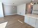 Bright dining area with hardwood floors and an accent wall at 405 19Th Avenue Nw Cir, Hickory, NC 28601