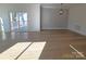 Bright dining room with hardwood floors and sliding glass doors to deck at 405 19Th Avenue Nw Cir, Hickory, NC 28601