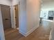 Elegant hallway with hardwood floors and modern doors at 405 19Th Avenue Nw Cir, Hickory, NC 28601