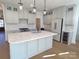 Spacious kitchen with light gray cabinets and marble countertops at 405 19Th Avenue Nw Cir, Hickory, NC 28601