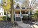 Quaint craftsman home, featuring a front porch and manicured landscaping at 716 Ellsworth Rd, Charlotte, NC 28211