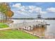 Picturesque dock leading to a gazebo on the lake at 907 Southwest Dr, Davidson, NC 28036