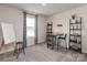 Neutral tone bedroom with a large window, carpeted floor, and furniture, ideal for an office, art studio, or multi-purpose space at 111 Sentinel Ct, Mooresville, NC 28115