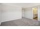 Simple bedroom with grey carpet and door at 1345 31St Ne St, Conover, NC 28613