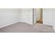 Spacious bedroom with carpet and access to bathroom at 1345 31St Ne St, Conover, NC 28613