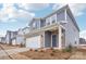 Two-story house with gray siding, brick accents, and a two-car garage at 1345 31St Ne St, Conover, NC 28613