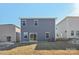 Rear view of a two-story house with gray siding at 1345 31St Ne St, Conover, NC 28613