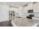 Modern kitchen with white cabinets, granite countertops and island at 1345 31St Ne St, Conover, NC 28613