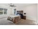 Spacious bedroom with a comfortable bed and window at 1356 Augustus Beamon Dr, Indian Trail, NC 28079