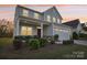 Two-story house with gray siding, stone accents, and porch at 1356 Augustus Beamon Dr, Indian Trail, NC 28079