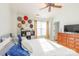 King-size bed, large TV, and ample closet space at 140 Rock Ridge Ln, Mount Holly, NC 28120