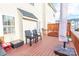 Private deck with two chairs and a view of the townhome at 140 Rock Ridge Ln, Mount Holly, NC 28120