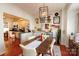 Bright dining area with kitchen views and hardwood floors at 140 Rock Ridge Ln, Mount Holly, NC 28120