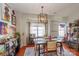 Dining room with hardwood floors and eclectic decor at 140 Rock Ridge Ln, Mount Holly, NC 28120