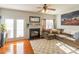 Living Room with fireplace and access to patio at 140 Rock Ridge Ln, Mount Holly, NC 28120