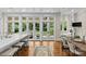 Spacious kitchen boasts a large island, lots of natural light and an eating area, perfect for entertaining at 1579 Queens W Rd, Charlotte, NC 28207