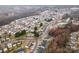 An aerial view of a residential area, showcasing a dense neighborhood and winding streets at 1708 Holliford Ct, Charlotte, NC 28215