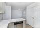 Bright kitchen with white quartz countertops and stainless steel dishwasher and view of dining area at 1708 Holliford Ct, Charlotte, NC 28215