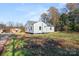 White house with gray roof, seen from the side yard at 2409 Crescent Ln, Gastonia, NC 28052