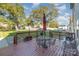 Wooden deck with patio furniture and a view of the backyard at 4813 Chesney Nw St, Concord, NC 28027