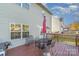 Deck with a table and chairs, offering an outdoor entertaining space at 4813 Chesney Nw St, Concord, NC 28027