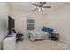 Bright bedroom with a double bed, TV, and ample floor space at 4813 Chesney Nw St, Concord, NC 28027