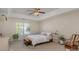 Well-lit bedroom with ceiling fan and plush carpeting at 4813 Chesney Nw St, Concord, NC 28027