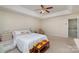 Bright bedroom with ceiling fan and large window at 4813 Chesney Nw St, Concord, NC 28027