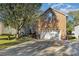 Brick house with a two-car garage and a well-maintained lawn at 4813 Chesney Nw St, Concord, NC 28027