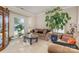 Bright living room with large windows and comfy seating at 4813 Chesney Nw St, Concord, NC 28027