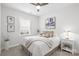 Cozy bedroom with ceiling fan and window coverings at 5003 Looking Glass Trl, Denver, NC 28037